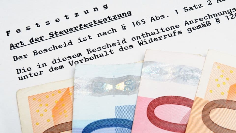 Deutscher Steuerbescheid / German tax bill in a studio shot